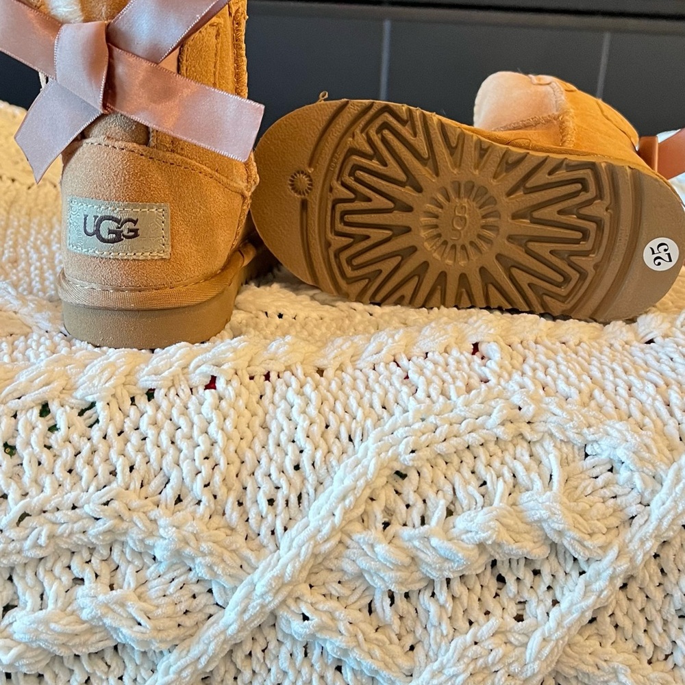 UGG Tan Boots with Pink Ribbon